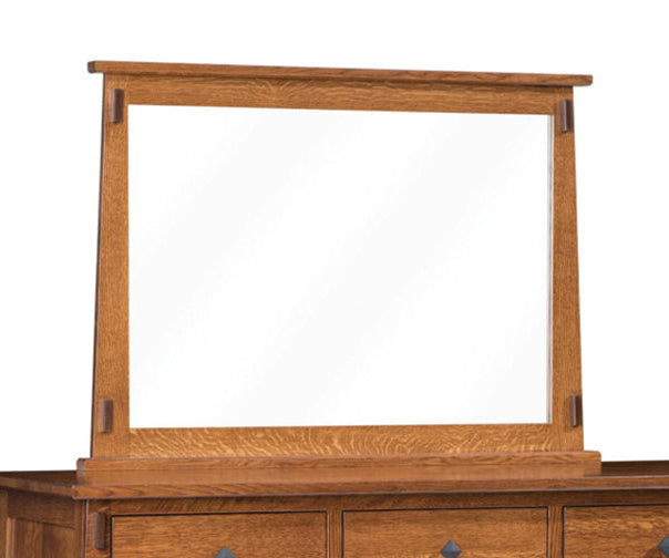Wooden dresser with mirror on a white background
